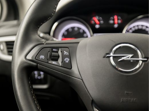 Opel Astra 1.2 Sport (APPLE CARPLAY, NAVIGATIE, CLIMATE, CRUISE, CAMERA, SPORTSTOELEN, LM VELGEN, PARKEERSEN... ActivLease financial lease