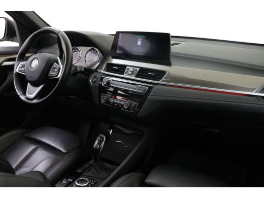 BMW X1 sDrive20i High Executive xLine Automaat / Trekhaak / Sportstoelen / Achteruitrijcamera / Comfort ... ActivLease financial lease