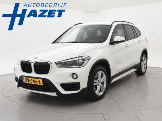 BMW X1 sDrive18i AUT. SPORTLINE + TREKHAAK | LED | SPORTSTOELEN | STOELVERWARMING | NAVIGATIE