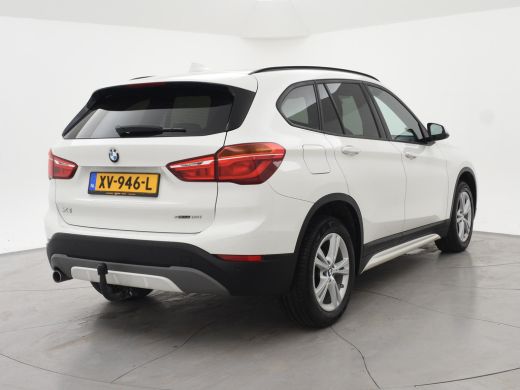 BMW X1 sDrive18i AUT. SPORTLINE + TREKHAAK | LED | SPORTSTOELEN | STOELVERWARMING | NAVIGATIE ActivLease financial lease