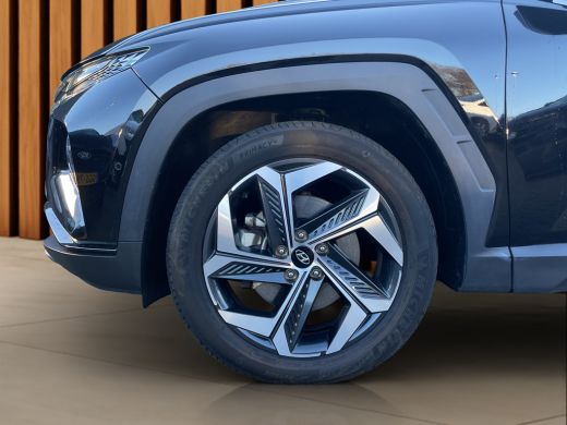 Hyundai Tucson 1.6 T-GDI 265pk PHEV Premium 4WD | Leder | Carplay | Climate | Keyless | Navigatie | Elek. Klep |... ActivLease financial lease