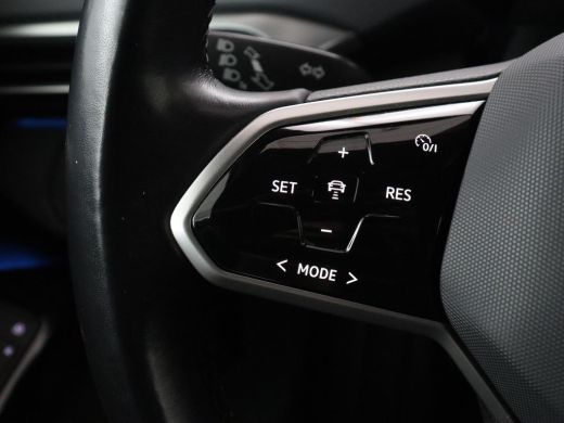 Volkswagen ID.4 First 77 kWh | Trekhaak | Stoel & stuurverwarming | Adaptive cruise | Camera | Carplay | Half led... ActivLease financial lease