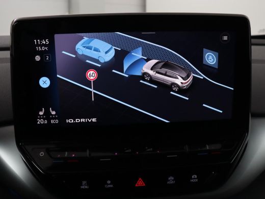 Volkswagen ID.4 First 77 kWh | Trekhaak | Stoel & stuurverwarming | Adaptive cruise | Camera | Carplay | Half led... ActivLease financial lease