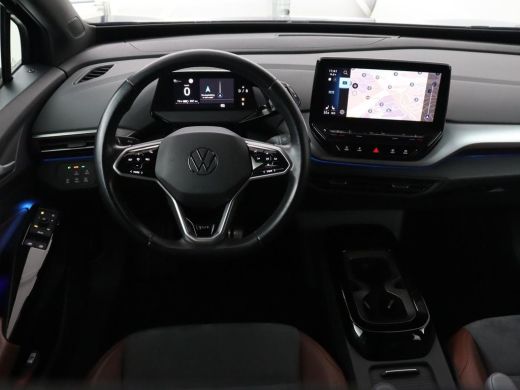Volkswagen ID.4 First 77 kWh | Trekhaak | Stoel & stuurverwarming | Adaptive cruise | Camera | Carplay | Half led... ActivLease financial lease