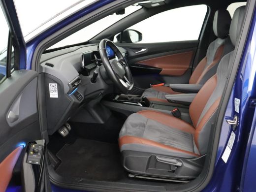 Volkswagen ID.4 First 77 kWh | Trekhaak | Stoel & stuurverwarming | Adaptive cruise | Camera | Carplay | Half led... ActivLease financial lease