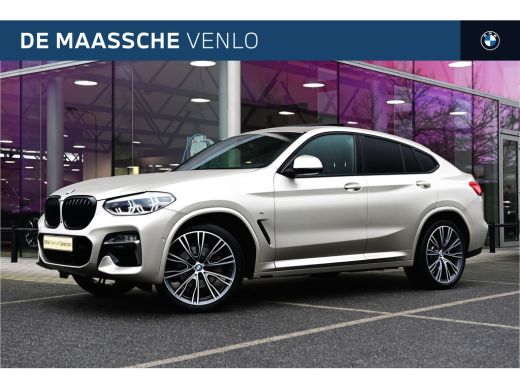 BMW X4 xDrive20i High Executive M Sport Automaat / Panoramadak / Trekhaak / Sportstoelen / Adaptief onde...