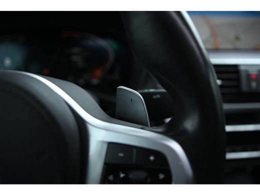 BMW X4 xDrive20i High Executive M Sport Automaat / Panoramadak / Trekhaak / Sportstoelen / Adaptief onde... ActivLease financial lease