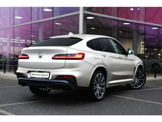 BMW X4 xDrive20i High Executive M Sport Automaat / Panoramadak / Trekhaak / Sportstoelen / Adaptief onde... ActivLease financial lease