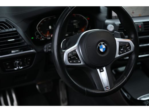 BMW X4 xDrive20i High Executive M Sport Automaat / Panoramadak / Trekhaak / Sportstoelen / Adaptief onde... ActivLease financial lease