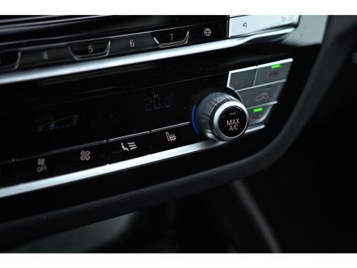 BMW X4 xDrive20i High Executive M Sport Automaat / Panoramadak / Trekhaak / Sportstoelen / Adaptief onde... ActivLease financial lease