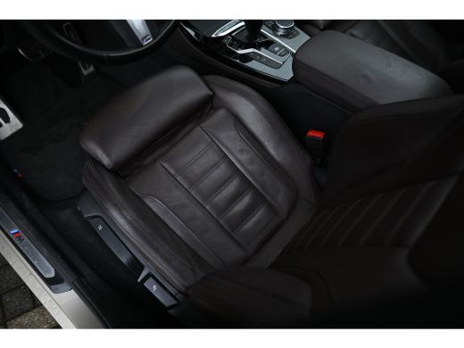 BMW X4 xDrive20i High Executive M Sport Automaat / Panoramadak / Trekhaak / Sportstoelen / Adaptief onde... ActivLease financial lease