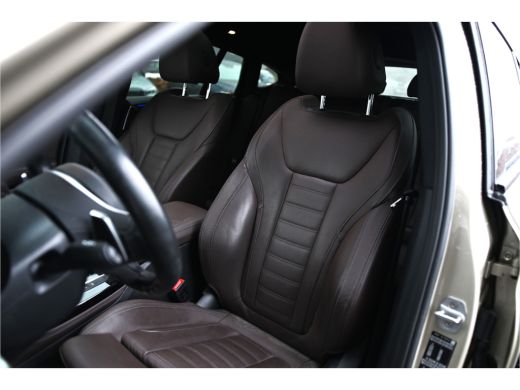 BMW X4 xDrive20i High Executive M Sport Automaat / Panoramadak / Trekhaak / Sportstoelen / Adaptief onde... ActivLease financial lease