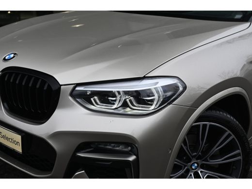 BMW X4 xDrive20i High Executive M Sport Automaat / Panoramadak / Trekhaak / Sportstoelen / Adaptief onde... ActivLease financial lease