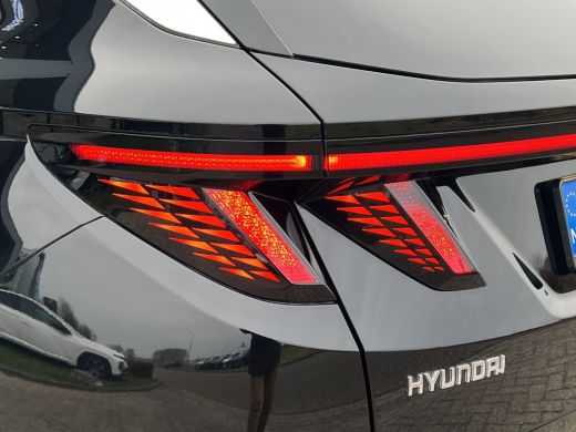 Hyundai Tucson 1.6 T-GDI PHEV Premium 4WD | Leder | Carplay | Climate | Keyless | Navigatie | Elek. Klep | Full ... ActivLease financial lease