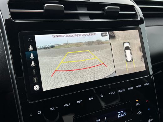 Hyundai Tucson 1.6 T-GDI PHEV Premium 4WD | Leder | Carplay | Climate | Keyless | Navigatie | Elek. Klep | Full ... ActivLease financial lease