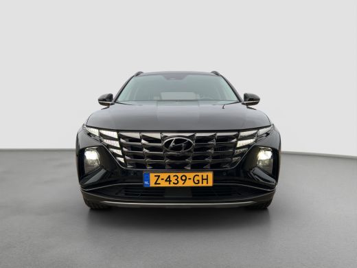 Hyundai Tucson 1.6 T-GDI PHEV Premium 4WD | Leder | Carplay | Climate | Keyless | Navigatie | Elek. Klep | Full ... ActivLease financial lease