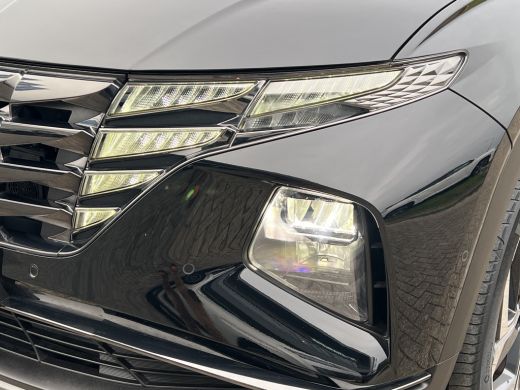 Hyundai Tucson 1.6 T-GDI PHEV Premium 4WD | Leder | Carplay | Climate | Keyless | Navigatie | Elek. Klep | Full ... ActivLease financial lease