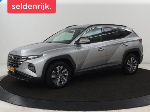 Hyundai Tucson 1.6 T-GDI HEV Comfort | Trekhaak | Leder | Stoelverwarming | Adaptive cruise | Carplay | Camera |...