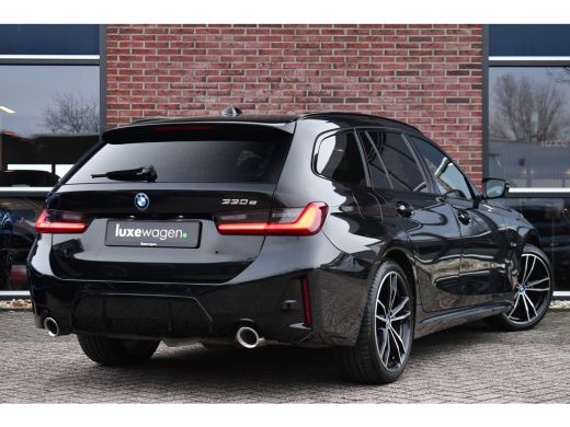 BMW 3 Serie Touring 330e M-Sport Pano ACC Trekh H/K HUD 19inch Stuurverw ActivLease financial lease