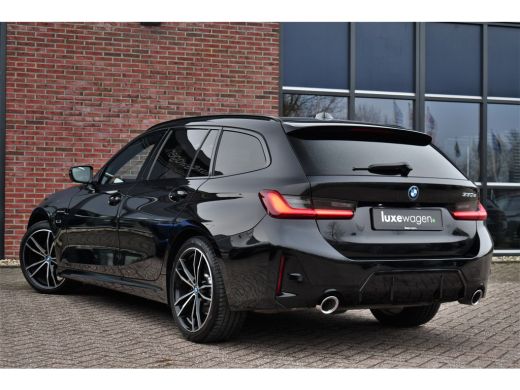 BMW 3 Serie Touring 330e M-Sport Pano ACC Trekh H/K HUD 19inch Stuurverw ActivLease financial lease