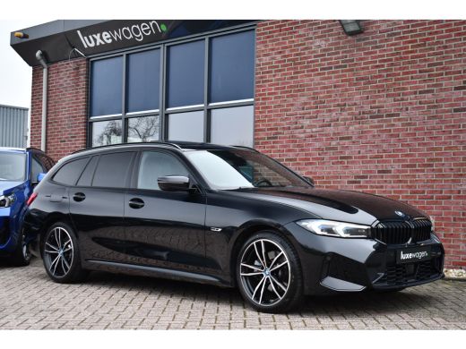 BMW 3 Serie Touring 330e M-Sport Pano ACC Trekh H/K HUD 19inch Stuurverw ActivLease financial lease