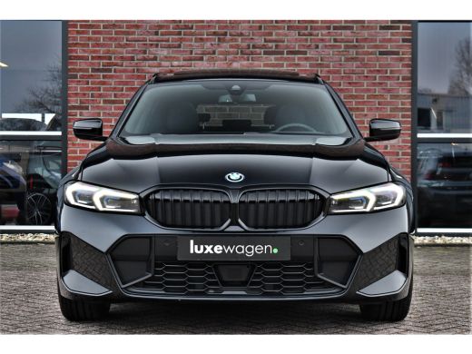 BMW 3 Serie Touring 330e M-Sport Pano ACC Trekh H/K HUD 19inch Stuurverw ActivLease financial lease