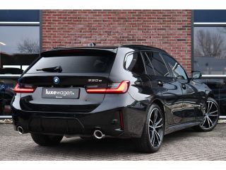 BMW 3 Serie Touring 330e M-Sport Pano ACC Trekh H/K HUD 19inch Stuurverw