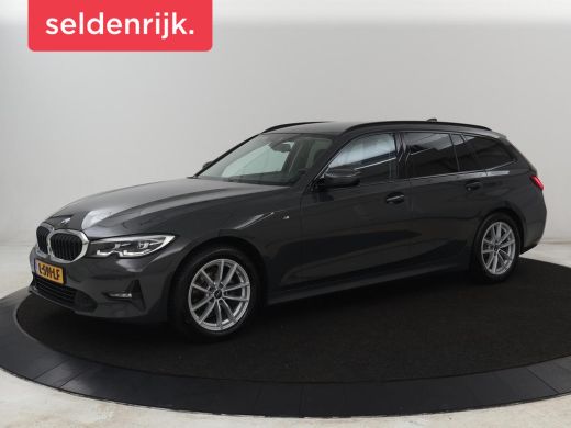 BMW 3 Serie 318i Business Edition | Trekhaak | Sportstoelen | Half leder | Adaptief LED | Carplay | Navigatie...