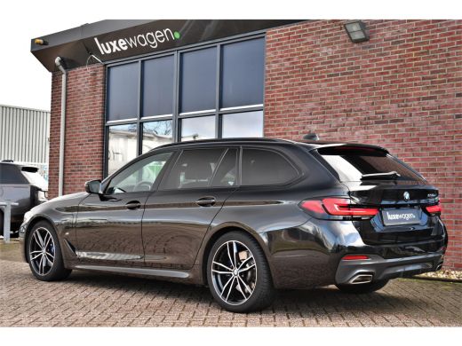 BMW 5 Serie Touring 530e 292pk M-Sport Pano ACC Trekh Comf-seat 360 HUD Laser 4wielbest ActivLease financial lease