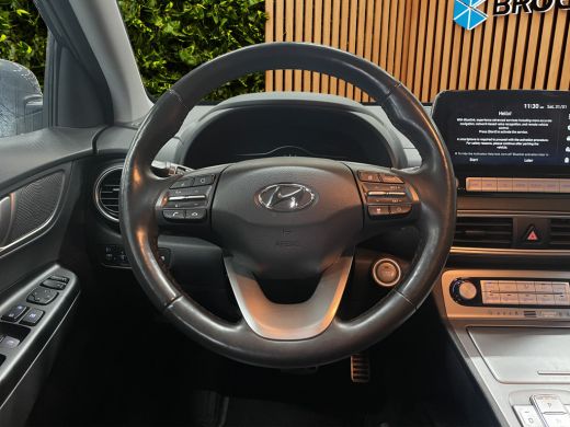 Hyundai Kona EV Premium 64 kWh | Navi | Adapt. Cruise | Stoel- stuurverw. | Head-up | Blis | LED | 17'' ActivLease financial lease