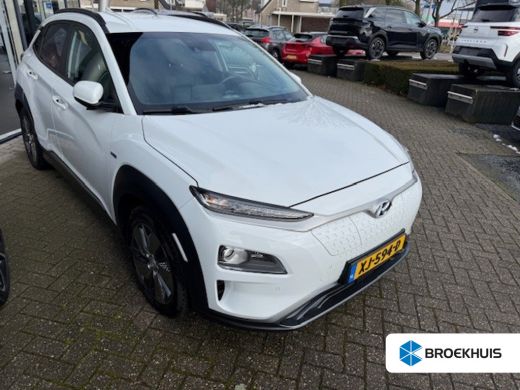 Hyundai Kona EV Premium 64 kWh | Leder | Stoel en stuur verwarming | Stoel ventilatie | | Achteruitrijcamera |...