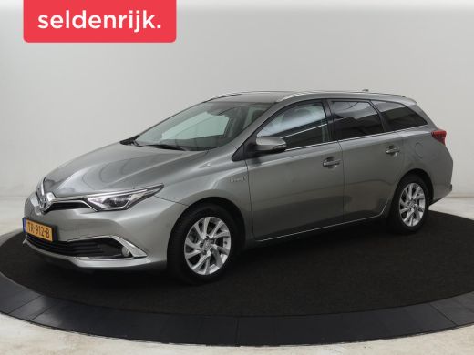 Toyota Auris 1.8 Hybrid Executive | Stoelverwarming | Half leder | Navigatie | Keyless | Climate control | Cru...