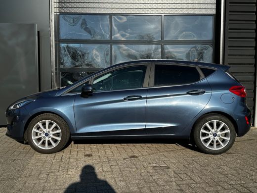 Ford Fiesta 1.0 95 PK Titanium X | ADAPTIEVE CRUISE CONTROL| STUUR, STOEL EN VOORRUITVERWARMING| NAVIGATIE + ... ActivLease financial lease