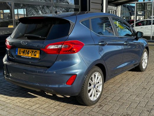 Ford Fiesta 1.0 95 PK Titanium X | ADAPTIEVE CRUISE CONTROL| STUUR, STOEL EN VOORRUITVERWARMING| NAVIGATIE + ... ActivLease financial lease