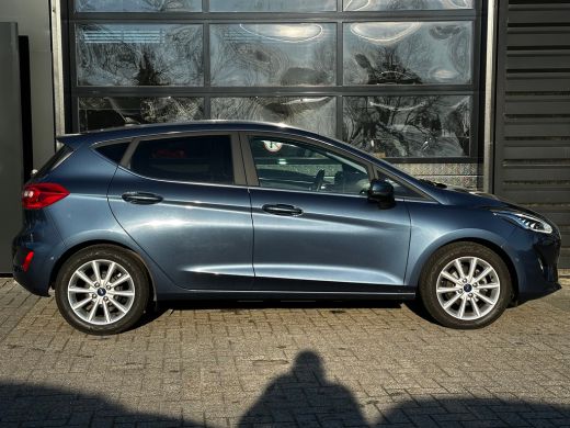 Ford Fiesta 1.0 95 PK Titanium X | ADAPTIEVE CRUISE CONTROL| STUUR, STOEL EN VOORRUITVERWARMING| NAVIGATIE + ... ActivLease financial lease