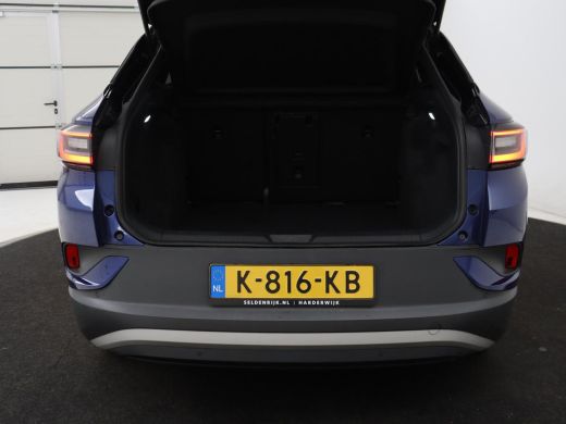 Volkswagen ID.4 First 77 kWh | SOH 90% | Stoel & stuurverwarming | Adaptive cruise | Camera | Carplay | Half lede... ActivLease financial lease