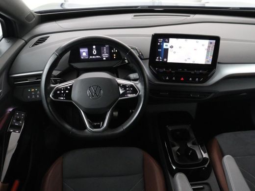 Volkswagen ID.4 First 77 kWh | SOH 90% | Stoel & stuurverwarming | Adaptive cruise | Camera | Carplay | Half lede... ActivLease financial lease
