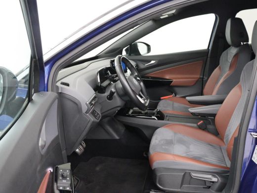 Volkswagen ID.4 First 77 kWh | SOH 90% | Stoel & stuurverwarming | Adaptive cruise | Camera | Carplay | Half lede... ActivLease financial lease