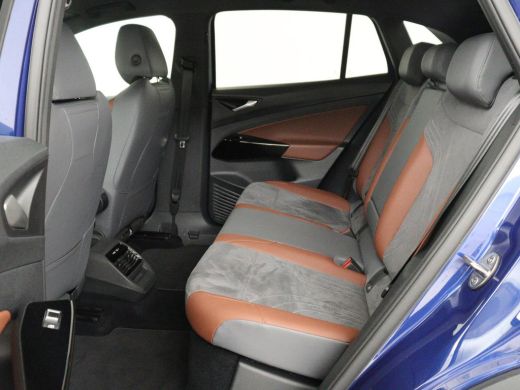 Volkswagen ID.4 First 77 kWh | SOH 90% | Stoel & stuurverwarming | Adaptive cruise | Camera | Carplay | Half lede... ActivLease financial lease