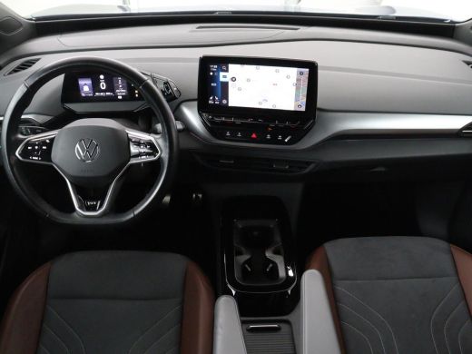 Volkswagen ID.4 First 77 kWh | SOH 90% | Stoel & stuurverwarming | Adaptive cruise | Camera | Carplay | Half lede... ActivLease financial lease