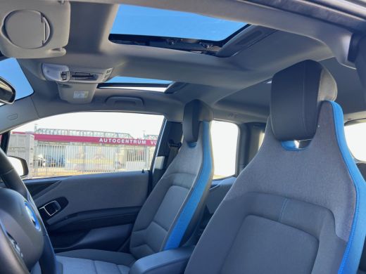 BMW i3 Executive 120Ah 42 kWh/Schuifdak/H-Kardon/Adaptive/Carplay/Camera/3-fase ActivLease financial lease