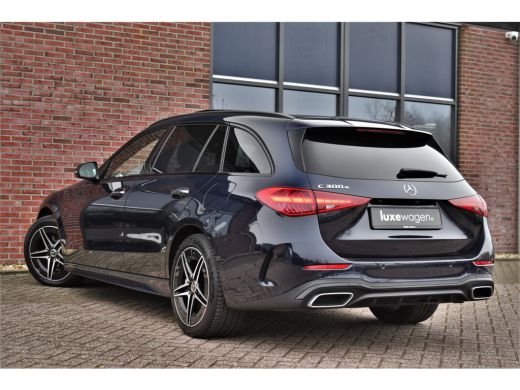 Mercedes-Benz C-Klasse Estate 300 e AMG Line Pano Trekh Distr Memory+Ventilatie HUD 360 Night ActivLease financial lease