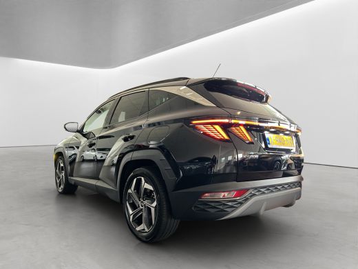 Hyundai Tucson 1.6 T-GDI 265pk PHEV Premium Sky 4WD (299,- p/m Demo Deal!) | Leder | Carplay | Climate | Keyless... ActivLease financial lease
