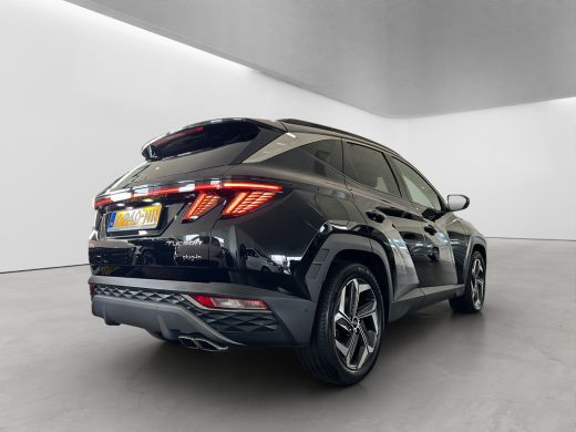 Hyundai Tucson 1.6 T-GDI 265pk PHEV Premium Sky 4WD (299,- p/m Demo Deal!) | Leder | Carplay | Climate | Keyless... ActivLease financial lease