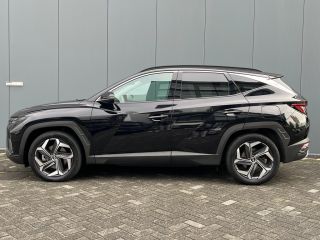 Hyundai Tucson 1.6 T-GDI 265pk PHEV Premium 4WD (299,- p/m Demo Deal!) | Leder | Carplay | Climate | Keyless | N...