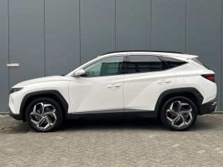 Hyundai Tucson 1.6 T-GDI 265pk PHEV Premium 4WD (299,- p/m Demo Deal!) | Leder | Carplay | Climate | Keyless | N...