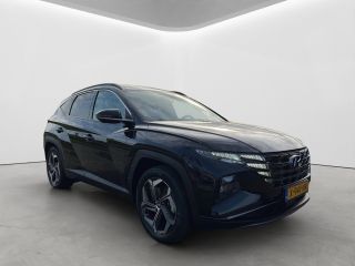 Hyundai Tucson 1.6 T-GDI 265pk PHEV Premium Sky 4WD (299,- p/m Demo Deal!) | Leder | Carplay | Climate | Keyless...