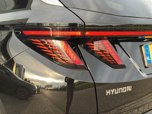 Hyundai Tucson 1.6 T-GDI 265pk PHEV Premium 4WD (299,- p/m Demo Deal!) | Leder | Carplay | Climate | Keyless | N... ActivLease financial lease