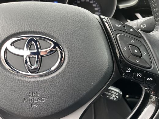 Toyota C-HR 1.8 Hybrid Style | Carplay | Parkeersensoren | Dode hoek waarschuwing | Navigatie | 18 inch LM-ve... ActivLease financial lease