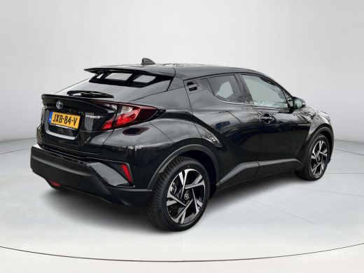 Toyota C-HR 1.8 Hybrid Style | Carplay | Parkeersensoren | Dode hoek waarschuwing | Navigatie | 18 inch LM-ve... ActivLease financial lease
